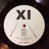 XI